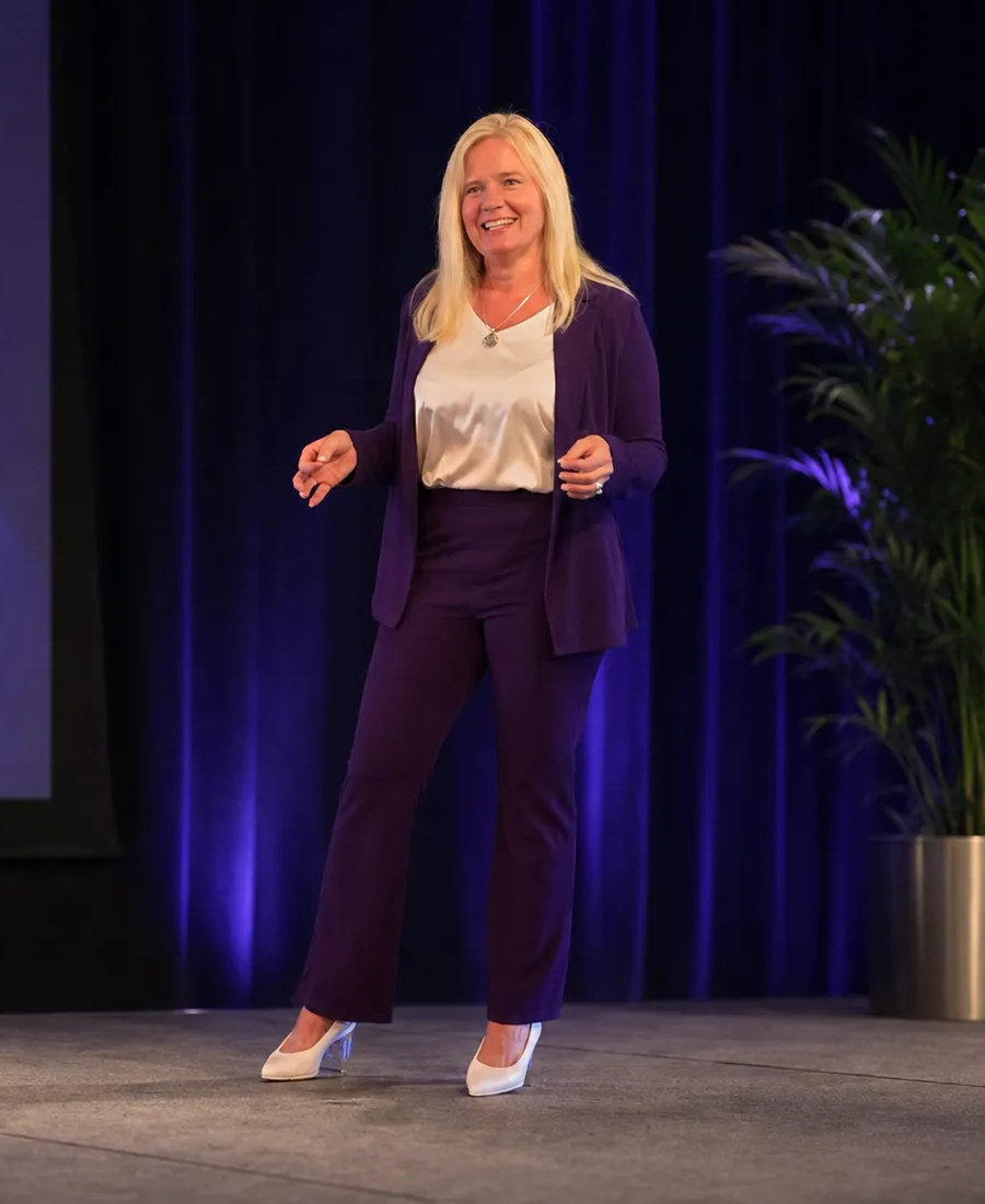 Dr. Cristi Bundukamara presenting on stage