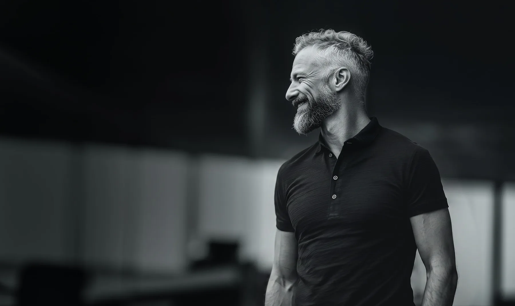 Executive leader smiling in a modern office